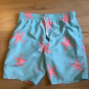 Maamgic brand swim trunks, light blue with pink starfish. Boy’s size 10/12